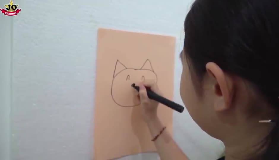 挑战背后画画！用抓糖果机做游戏 